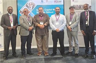 CIFCA Secretary general, Mr. Salum Lupande (extreme left) and Zanzibar Sukuk CPA Chairman - CPA Juma Amour (extreme right) in a group picture with IsDBI representative - Brother Syde Najeeb (fourth from left) on a group picture.